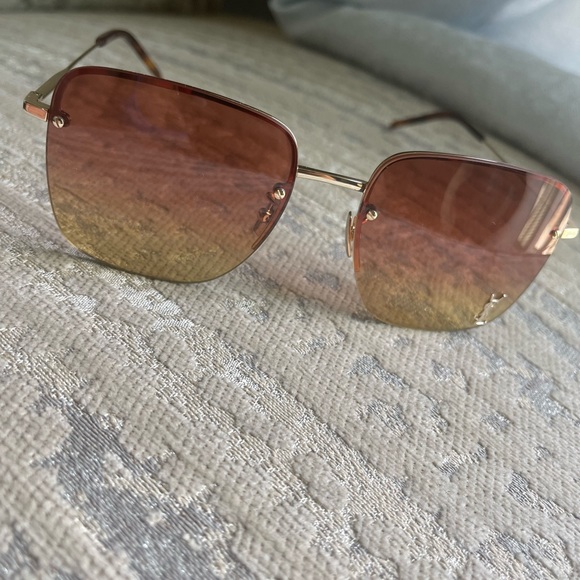 SAINT LAURENT
Half Rim Squared Feminine Sunglasses
Size: one size. Original - Picture 2 of 3